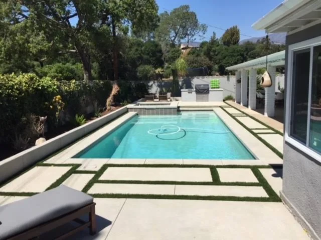 Modern pool with lounge area